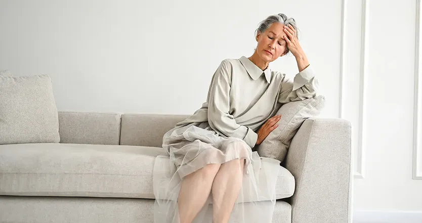 Woman sitting on couch